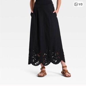 Black maxi skirt with cut work detail, size small
